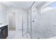 Large bathroom with a walk-in shower and marble tile at 6019 Wheeler Ridge Rd, Auburn, GA 30011