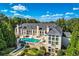 Luxury home with pool and landscaped backyard at 9620 Cedar Grove Rd, Chattahoochee Hills, GA 30213