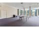 Finished basement with ping pong table and home gym at 9620 Cedar Grove Rd, Chattahoochee Hills, GA 30213