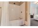 Bathroom with shower/tub combo and updated fixtures at 9620 Cedar Grove Rd, Chattahoochee Hills, GA 30213
