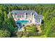 Luxury home with a large pool and manicured grounds at 9620 Cedar Grove Rd, Chattahoochee Hills, GA 30213