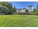 Expansive backyard with large home and lush green lawn at 9620 Cedar Grove Rd, Chattahoochee Hills, GA 30213