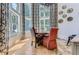 Charming breakfast nook with a round table and large windows at 9620 Cedar Grove Rd, Chattahoochee Hills, GA 30213