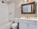 Bathroom with shower/tub, vanity, and ornate mirror at 9620 Cedar Grove Rd, Chattahoochee Hills, GA 30213