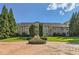 Impressive two-story home with a grand entrance and fountain at 9620 Cedar Grove Rd, Chattahoochee Hills, GA 30213