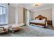 Spacious Primary bedroom with a king-size bed and access to a balcony at 9620 Cedar Grove Rd, Chattahoochee Hills, GA 30213