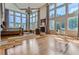 Luxurious main bedroom with hardwood floors, fireplace, and access to pool at 9620 Cedar Grove Rd, Chattahoochee Hills, GA 30213