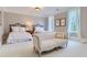 Charming bedroom with two beds, a sofa, and ample natural light at 9620 Cedar Grove Rd, Chattahoochee Hills, GA 30213