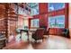 Home office with wood-paneled walls, a spiral staircase, and large windows at 9620 Cedar Grove Rd, Chattahoochee Hills, GA 30213