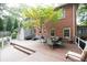 Spacious deck with seating area and built-in grill at 1323 Briarcliff Ne Rd, Atlanta, GA 30306