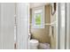Small bathroom with toilet and window at 1323 Briarcliff Ne Rd, Atlanta, GA 30306