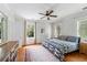 Spacious main bedroom with hardwood floors and large windows at 1323 Briarcliff Ne Rd, Atlanta, GA 30306