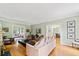 Spacious living room with hardwood floors and neutral walls at 1323 Briarcliff Ne Rd, Atlanta, GA 30306