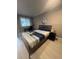 Bedroom with a queen bed and a work desk at 1323 Briarcliff Ne Rd, Atlanta, GA 30306