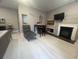 Living area with fireplace and kitchenette at 1323 Briarcliff Ne Rd, Atlanta, GA 30306