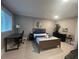 Bedroom with a queen bed, desk, and dresser at 1323 Briarcliff Ne Rd, Atlanta, GA 30306