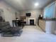 Living room with fireplace, TV and chaise lounge at 1323 Briarcliff Ne Rd, Atlanta, GA 30306