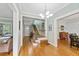 Elegant entryway with hardwood floors, a grand staircase, and views to living and dining areas at 1323 Briarcliff Ne Rd, Atlanta, GA 30306