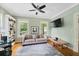 Bright living room with built-in shelving and hardwood floors at 1323 Briarcliff Ne Rd, Atlanta, GA 30306