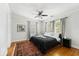 Elegant bedroom with hardwood floors and a large bed at 1323 Briarcliff Ne Rd, Atlanta, GA 30306