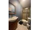 Clean bathroom with a shower, toilet, and vanity at 1323 Briarcliff Ne Rd, Atlanta, GA 30306