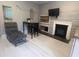 Living room with fireplace, TV and chaise lounge at 1323 Briarcliff Ne Rd, Atlanta, GA 30306