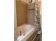 Bathroom with bathtub and shower at 2884 Mountbery Dr, Snellville, GA 30039