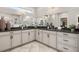 Elegant bathroom with double vanity, large mirror, and a walk-in shower at 3749 Tielman St, Snellville, GA 30078