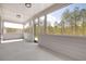 Bright screened porch overlooking a wooded area at 3749 Tielman St, Snellville, GA 30078