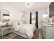 Cozy bedroom featuring a queen-size bed and large window at 3749 Tielman St, Snellville, GA 30078