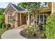 Inviting front porch with landscaping and walkway at 1845 Chloe Ct, Lawrenceville, GA 30043