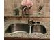 Stainless steel double sink with granite countertop in a modern kitchen at 898 Oak Sw St # 3108, Atlanta, GA 30310