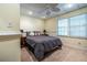 Bright basement bedroom with two windows and ceiling fan at 652 Trailwood Sw Ln, Marietta, GA 30064