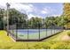 Well-maintained tennis court with fencing at 652 Trailwood Sw Ln, Marietta, GA 30064