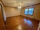 Hardwood floors and large windows in this main bedroom at 2805 Bridle Path Southeast Se Path, Conyers, GA 30094