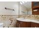Bathroom with updated vanity and stone tile at 178 Seals Dr, Dallas, GA 30157