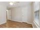 Spacious bedroom featuring wood-look floors and ample natural light at 178 Seals Dr, Dallas, GA 30157