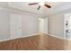 Bright bedroom with wood flooring and access to bathroom at 178 Seals Dr, Dallas, GA 30157