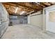 Unfinished basement with garage access and workshop area at 178 Seals Dr, Dallas, GA 30157