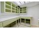 Basement storage area with green cabinets and counter space at 178 Seals Dr, Dallas, GA 30157