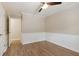 Bedroom with wood flooring and access to hallway at 178 Seals Dr, Dallas, GA 30157