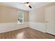 Bedroom with wood flooring and wainscoting at 178 Seals Dr, Dallas, GA 30157