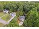 Aerial view of a neighborhood featuring houses surrounded by lush greenery at 178 Seals Dr, Dallas, GA 30157