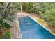 Aerial view of a rectangular in-ground pool with a cover at 178 Seals Dr, Dallas, GA 30157