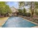 Home with deck and in-ground pool featuring a safety cover at 178 Seals Dr, Dallas, GA 30157