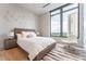 Bright bedroom with city views and modern furnishings at 3376 Peachtree Ne Rd # 32A, Atlanta, GA 30326