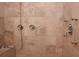 Luxurious shower with multiple shower heads and beige tile at 3021 Margaret Mitchell Dr # 8, Atlanta, GA 30327