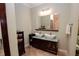 Bathroom with double vanity, tiled floor, and large mirror at 3021 Margaret Mitchell Dr # 8, Atlanta, GA 30327