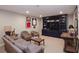 Finished basement with built-in shelving, comfortable seating, and ample space at 3021 Margaret Mitchell Dr # 8, Atlanta, GA 30327