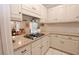 Well-equipped kitchen with granite countertops and white cabinets at 3021 Margaret Mitchell Dr # 8, Atlanta, GA 30327